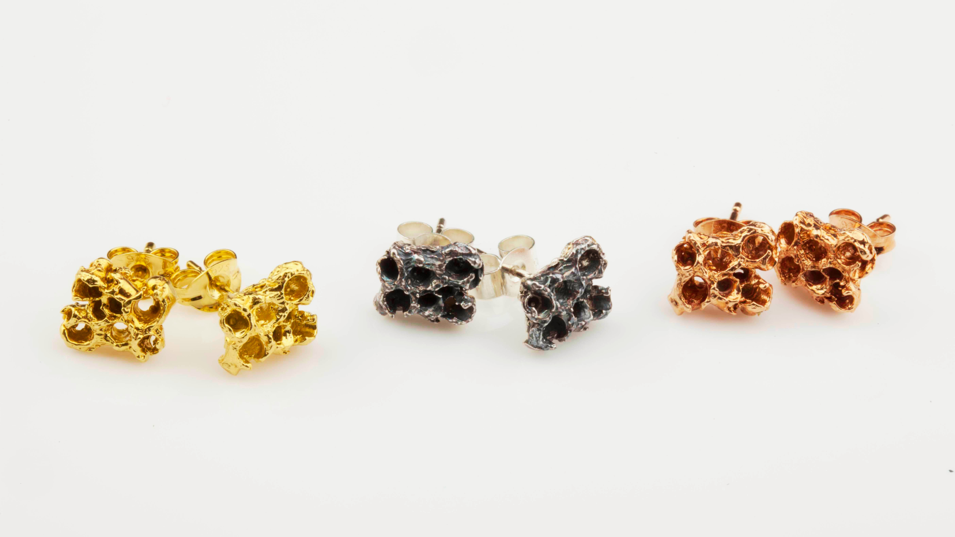 STATEMENT STUD EARRINGS